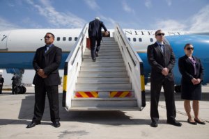 U.S. Secretary of State John Kerry climbs up the stairs of the plane to leave Tel Aviv this week.